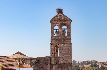 Fototapeta na wymiar Bell Tower of Church of Santa María de la Granada in Niebla, Huelva, Spain