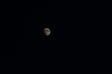 Moon in dark sky