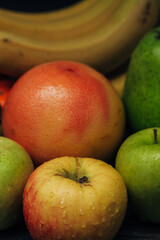 Apple Close Up With Water Droplets on the Peel