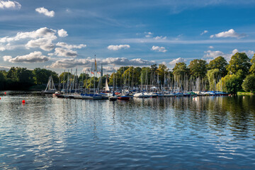 Fototapeta na wymiar Hamburg, Germany. The Lake Alster with boats and marina.