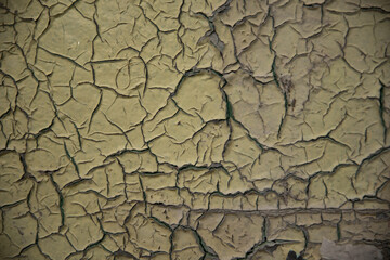 Texture grunge pouvant servir d'arrière-plan ou de fond. Mur ancien avec de la peinture écaillée donnant un aspect texturé très graphique.