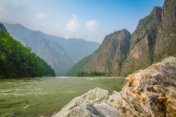 Fototapeta na wymiar Rafting mountain river Oka Sayanskaya, rapids 