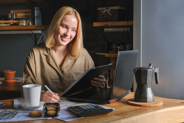 Investments. Young woman investor buys stocks on the stock exchange stock market from home....