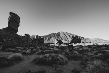 Black and white scenery of a barren volcanic landscape with sharp rocks and desert. Panorama of the island Tenerife, Canary Islands, with the Teide volcano and its lava flows..Wallpaper and nature