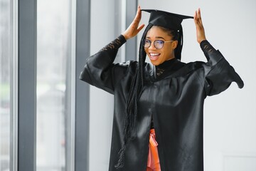 A pretty african american woman graduate