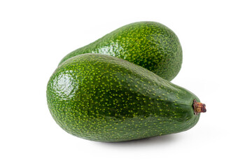 Two green avocados isolated on a white background