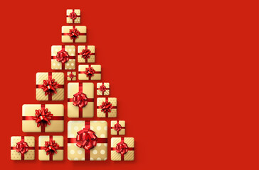 Yellow gift boxes with red bows like triangle Christmas tree.