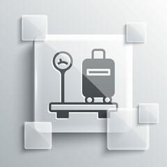 Grey Scale with suitcase icon isolated on grey background. Logistic and delivery. Weight of delivery package on a scale. Square glass panels. Vector