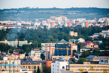 Aerial view over the city on the sunset with the University of Medicine and Pharmacy. Cluj Napoca, Romania.