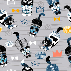 Childish seamless pattern with funny creative hand drawn cats.Trendy scandinavian vector background.Perfect for kids apparel,fabric,textile,nursery decoration,wrapping paper.