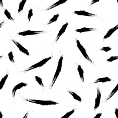 Abstract seamless background with black spots that look like compressed matches.