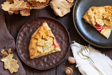 Whole wheat gallet with apple and pear, served with coffee. Rustic style.