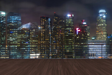 Panoramic Singapore skyline view, wooden observatory deck on rooftop, night time. Asian corporate and residential lifestyle. Financial city downtown, real estate. Product display mockup empty roof