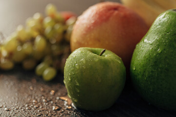 Apple Close Up With Water Droplets on the Peel