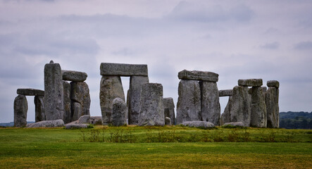 Naklejka premium Stonehenge prehistoric monument on Salisbury Plain in Wiltshire, England, United Kingdom, September 13, 2021. A ring circle of henge megalithic stones, heel stone, bluestone trilithons, UK.