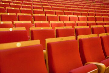 Upholstered chairs in an empty concert hall. Pandemic