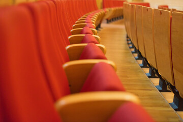 Fototapeta premium Upholstered chairs in an empty concert hall. Pandemic