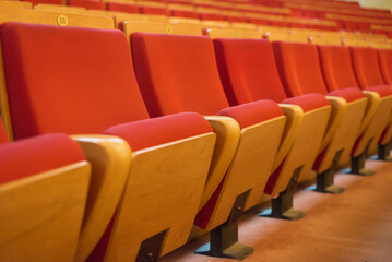 Upholstered chairs in an empty concert hall. Pandemic