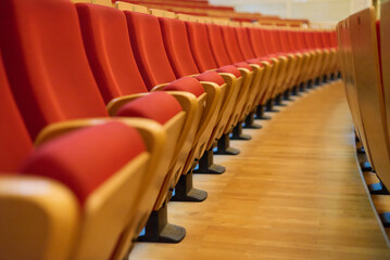 Upholstered chairs in an empty concert hall. Pandemic