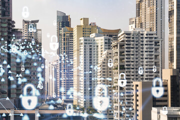 Padlock icon hologram over panorama city view of Bangkok to protect business in Southeast Asia. The concept of information security shields. Double exposure.