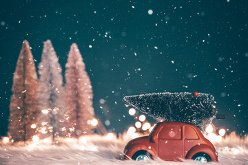 Christmas decoration with snow and little red car