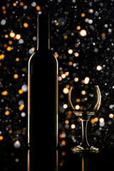 festive background with lights and silhouettes of a bottle and a glass