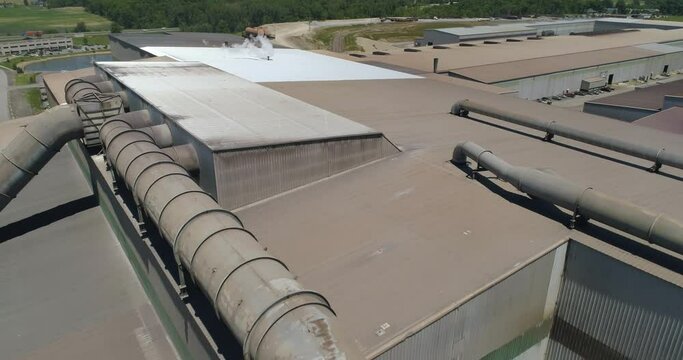 Aerial 4K Shot of massive Steel Manufacturing facility, Stock Yards, Blast Furnace, etc.