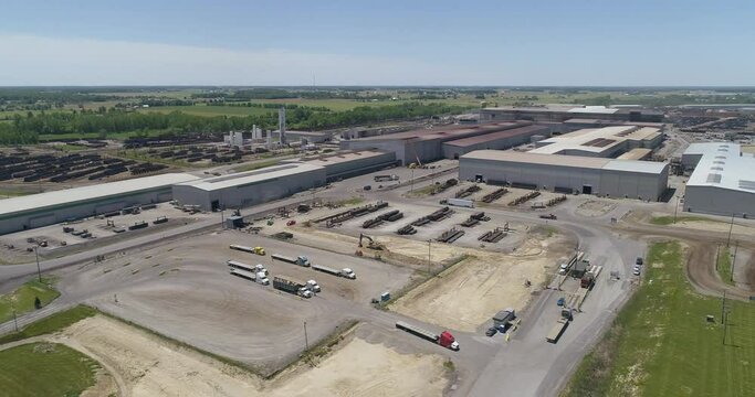 Aerial 4K Shot of massive Steel Manufacturing facility, Stock Yards, Blast Furnace, etc.