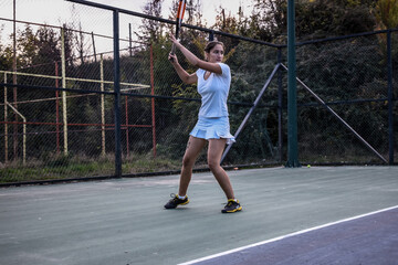 Fototapeta na wymiar Tennis player outside female 