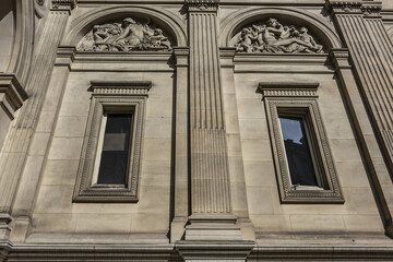 Architectural fragments of City Hall of Paris (Hotel de Ville de Paris) neo-renaissance style building - seat of the Paris City Council since 1357. Paris, France.