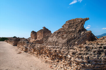 Fototapeta na wymiar Excavations in Nora, Sardinia - remains of old brick walls