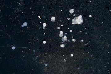 gass bubbles of a lake trapped in ice