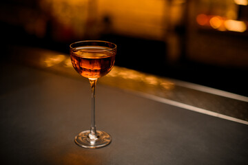 angle view of beautiful wine glass with drink on the table