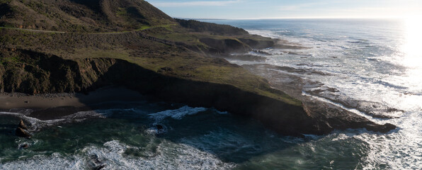 The cold Pacific Ocean washes onto the rugged coastline of Northern California north of Fort Bragg. The Pacific Coast Highway runs right along this scenic region in Mendocino County.
