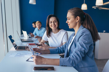 Students sitting at a table in class