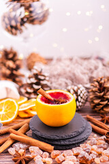 Gluhwein sweet hot warm Mulled red Wine or punch tea in mug cup glass spices citrus aromatic cinnamon star anise German tradition winter Christmas market beverage drink new year holidays festival