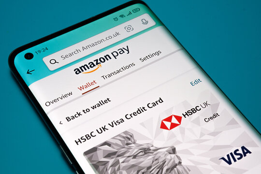 HSBC UK VISA CREDIT CARD seen in Amazon Pay section of Amazon Shopping app as main payment method. Concept. Stafford, United Kingdom, November 21, 2021.