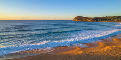 Surfs up aerial sunrise seascape