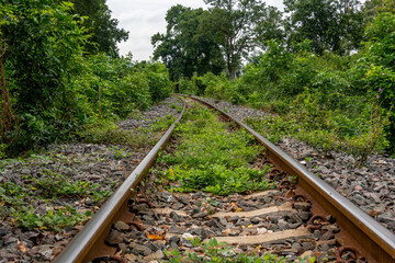 Railway tracks leading from the bridge over the River Kwai near Kanchanaburi Thailand