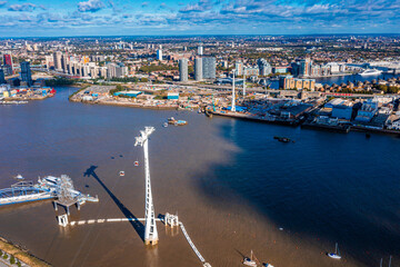 Aerial view of Emirates Air Line cable cars. The service is the UK's first urban cable car running...