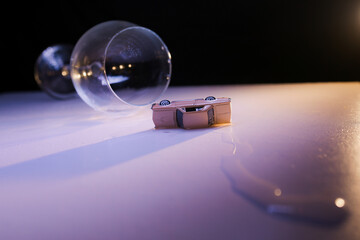 Toy car and wine glass. Toy car.