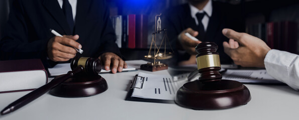 Concepts of Law and Legal services. Lawyer working with law interface icons. Blurred background.	
