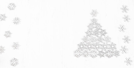 Christmas Composition. Snowflakes on white wooden Background. Flat Lay.