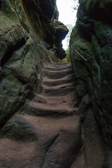 Stairway in a little stone canyon in Saxon Switzerland national park, Germany