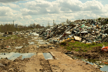 Garbage dump. Illegal dump in Russia. Garbage and writing waste. Harm to ecology. Improper storage...