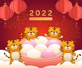 Fototapeta premium Chinese red lanterns, tiger mascots and glutinous rice balls, Chinese desserts made of glutinous rice, Chinese New Year or Lantern Festival or Winter Solstice