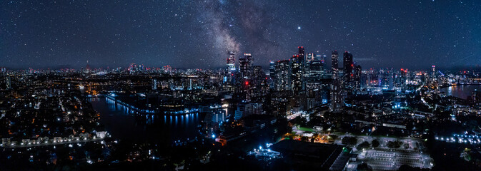 Aerial bird's eye view of famous Canary Wharf skyscraper complex, Isle of Dogs in London, United Kingdom