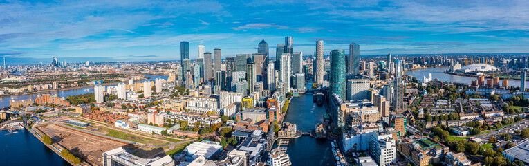 Aerial panoramic view of the Canary Wharf business district in London, UK. Financial district in...