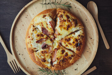 Delicious fresh pizza served on wooden plate, Hot Homemade Pizza Ready to serve.