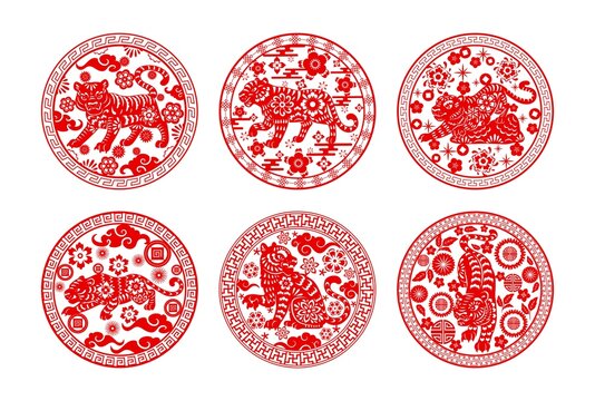 Chinese papercut tigers, Chinese lunar new year and zodiac signs, vector icons. China Asian new year or lunar calendar symbol tiger with paper cut art ornaments of clouds, flowers and coins